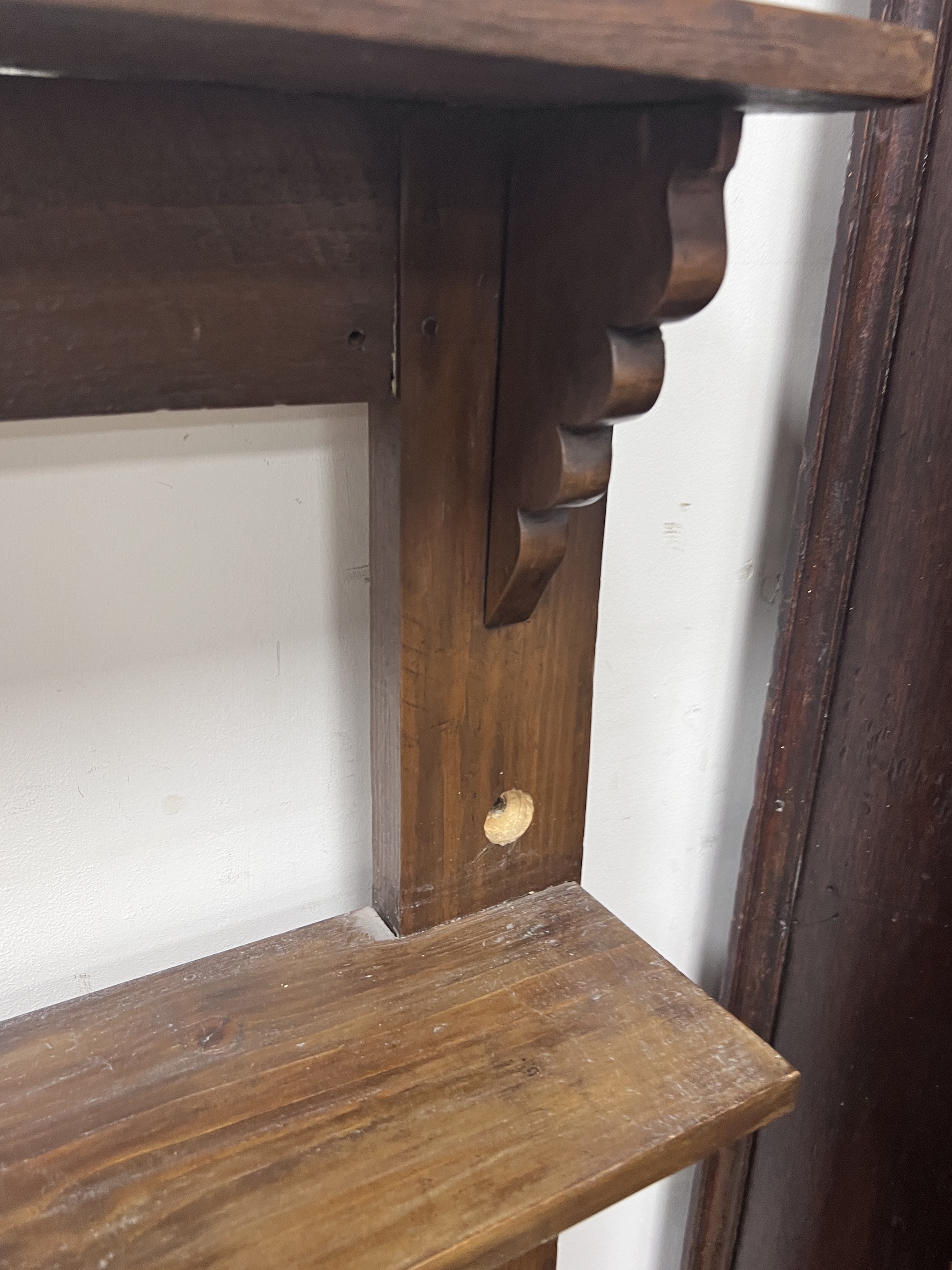 A provincial pine four tier hanging wall bracket, width 85cm, depth 21cm, height 102cm